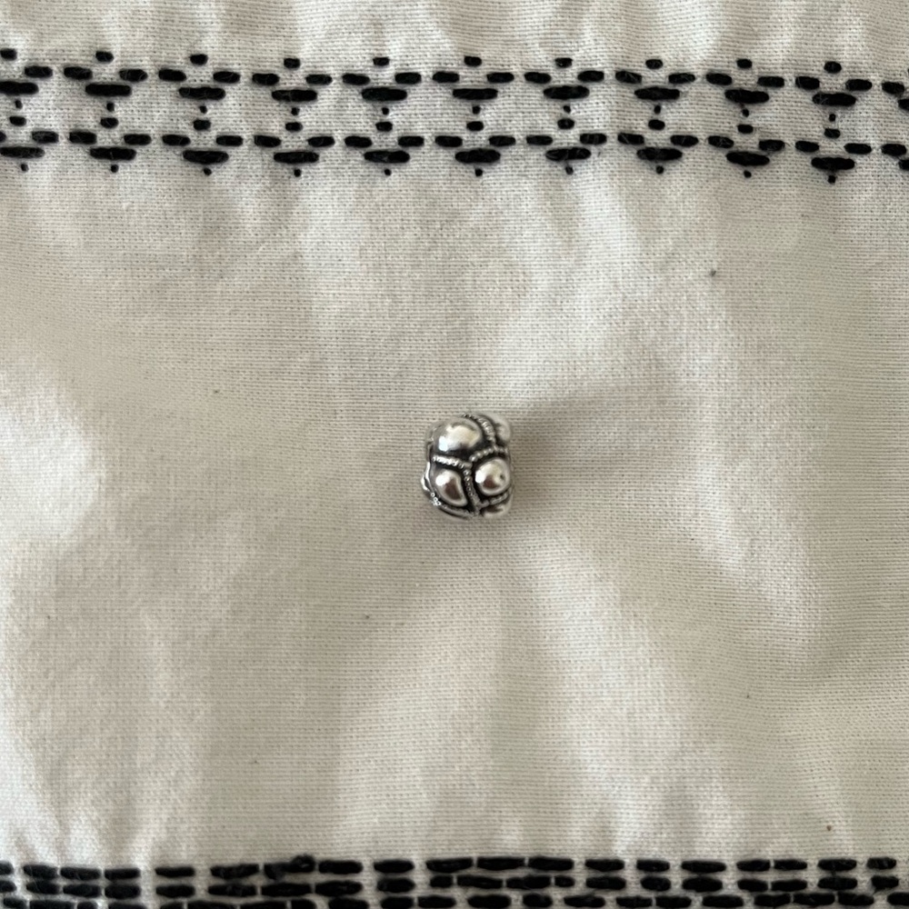 PANDORA Journey charm.